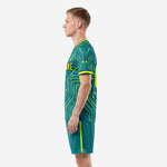 Right side view of custom teal soccer uniform set with neon yellow stripe on shorts
