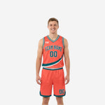 Front view of custom teal reversible basketball jersey with coral-orange diagonal swooping stripe and matching teal shorts with orange hem binding