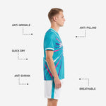 White soccer shorts with teal stripe and sublimated player number from teal soccer uniform set