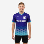 Men's teal soccer training jersey in royal purple with teal wave graphic and team name print, front view