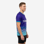 Custom teal soccer training jersey showing royal purple body and teal wave pattern, left side view