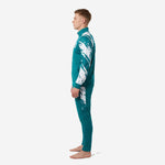 Teal soccer tracksuit with white brush-stroke panels on jacket sleeve and outer thigh, right side view