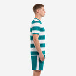 Side view of teal and white custom soccer kit showing horizontal hoop pattern on jersey and matching shorts