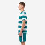 Right side view of teal white sublimated soccer uniform showing white side panel on teal shorts