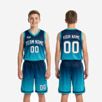 Back view of teal youth basketball uniform set displaying back player name and number on navy-to-teal gradient with matching sublimated shorts