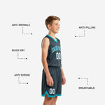 Close-up detail of charcoal basketball shorts showing teal chevron hem trim and white player number 00 on left leg panel