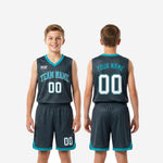 Size and specification sheet for custom teal youth basketball uniforms in charcoal showing youth size run and print zone layout