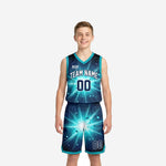 Custom teal youth basketball uniforms with navy starburst sublimated print, V-neck jersey and matching shorts, front view