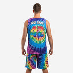 Close detail of tie-dye custom basketball uniforms showing rainbow swirl pattern and neckline trim