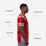 close detail of red custom American football jersey sleeve stripes, white and grey trim, and shoulder cap number