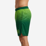 Opposite side view of forest green travel team basketball shorts with honeycomb pattern fading from waist to mid-thigh