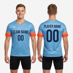 V-neck collar detail with contrast orange trim on sky blue custom soccer training jersey, sublimated full-dye print