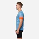 V neck training jersey with full-dye sublimated orange fade on short sleeves and sky blue polyester body, right side view