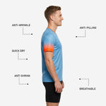 Close-up of neon orange gradient sleeve fade on sky blue custom soccer training jersey for mens squads