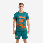 Vintage soccer kits teal and orange halftone dot sublimated full uniform set front view on male model
