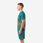 Vintage soccer kits teal orange dot pattern sublimated full kit right side profile view showing shorts detail