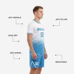 Custom sky blue soccer shorts detail showing full-dye sublimated dot-burst print and white chevron leg graphic with player number
