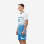 Custom blue and white soccer uniforms right side view showing V-neck trim sleeve cuffs and matching sublimated shorts with chevron graphic