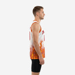White and orange sublimated basketball jersey with orange flame design rising from hem and red chest print - full front view