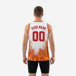 Right side view of white and orange basketball jersey with flame sublimation and athletic sleeveless cut