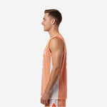 Side view of orange and white basketball jersey showing white side panel running from armhole binding to straight hem