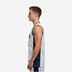 Side view of white basketball jersey showing navy side panel with gold accent stripe running from armhole to hem
