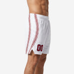 White basketball shorts side view showing full-length red baseball-stitch graphic on side panel and elastic waistband
