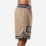 Hem and side split detail of custom white basketball shorts with navy panel and clean finished leg opening