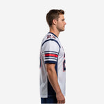 Back view of white navy custom American football jersey showing back number nameplate and navy side panels