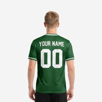 Close detail of white trim custom green soccer team jersey showing sublimated tonal pattern across Forest Green body panels