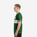 Forest Green custom soccer team jersey with white mid-chest band and tonal geometric sublimation pattern, right side view