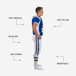 Full set view of white youth football uniforms showing royal blue jersey and white pants together as a complete 2-piece American football uniform