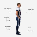 Full back view of wholesale American football uniform jersey and pants set in white and navy with sublimated player name and number zones