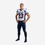 Wholesale American football uniforms in white and navy with curved side panels, V-neck collar, red-outlined front number 23, and matching navy pants with white side stripe - front view