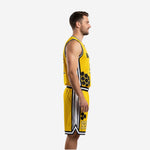 Left side view of yellow black sublimated basketball uniform showing white side panel detail