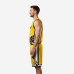 Right side view of custom yellow basketball uniform kit with hexagon graphic on shorts leg