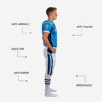 Back view of custom youth american football team uniforms in royal blue with navy shoulder panels and white full-length pants with side chevron detail