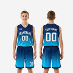 Size and specification sheet for custom blue and white youth basketball uniforms in navy and cyan gradient