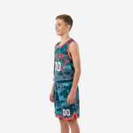 Opposite side view of youth camo basketball uniform set in teal with orange crack pattern and matching shorts waistband drawcord
