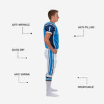 Back view of blue and white youth football uniform for teams showing nameplate area, back number placement, navy shoulder panels and white pants with vertical side stripe