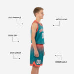 Full set view of youth sublimated basketball uniforms, teal and orange two-piece jersey and shorts with halftone dot gradient pattern
