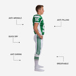 Full set view of green and white youth football uniform showing jersey and matching pants together as a complete two-piece game day kit